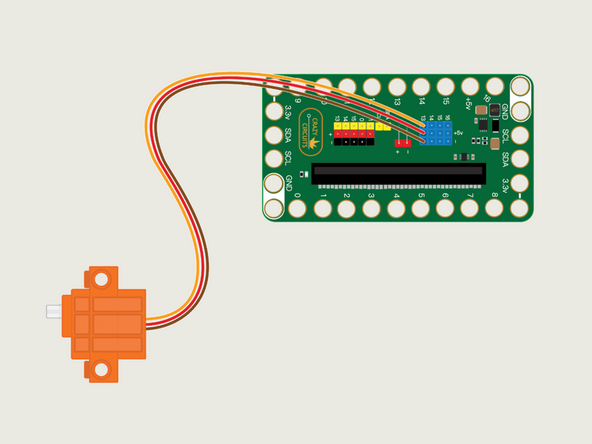 The servo has three wires connected to it that terminate in a black connector plug. This connector is what we will plug into the Bit Board header pins.