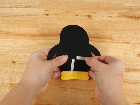 Place another piece of Maker Tape OVER THE TOP of the LED legs so the LED legs have Maker Tape under and on top of them.