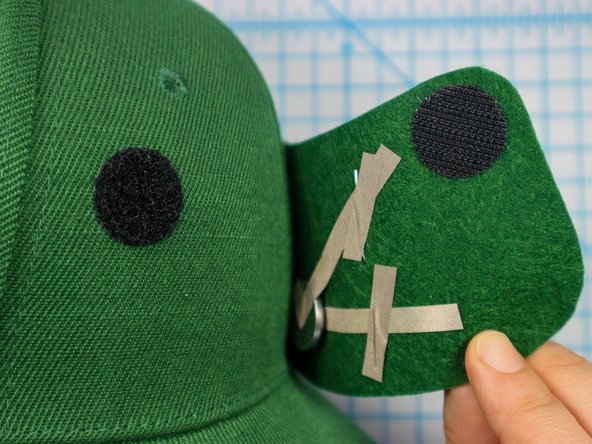 Carefully peel the hook and loop apart and squeeze each dot separately to set the adhesive.