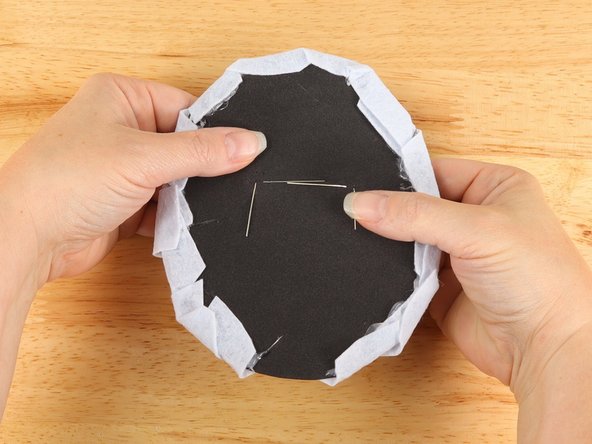 Bend the shorter (Negative) LED legs down towards the bottom.