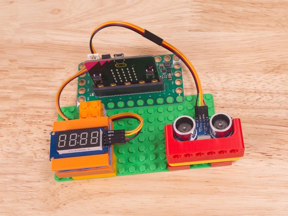 Start by plugging the connector with the three wires in it (Black, Red, Yellow) into the Pin 1 row of the Bit Board. (Make sure the Black wire is in - and the Yellow wire labeled S1 is closest to the number 1 on the Bit Board.)