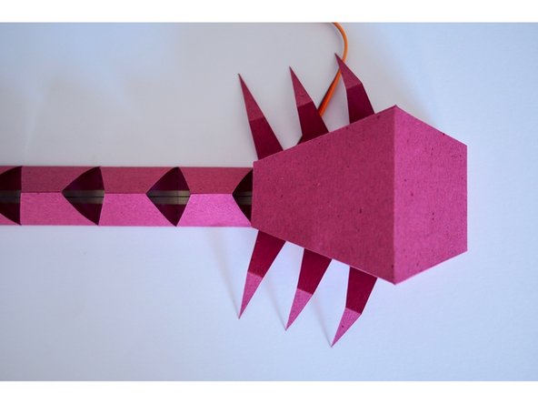 Fold the legs to make them more insect-like.