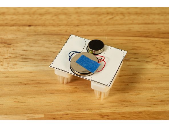 Stick the red motor wire down and it should start to vibrate!