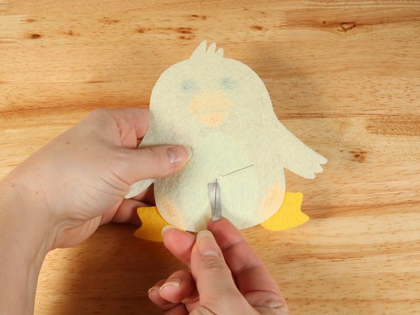 Bend the shorter (Negative) LED leg down toward the bottom and the longer (Positive) LED leg over towards the right.