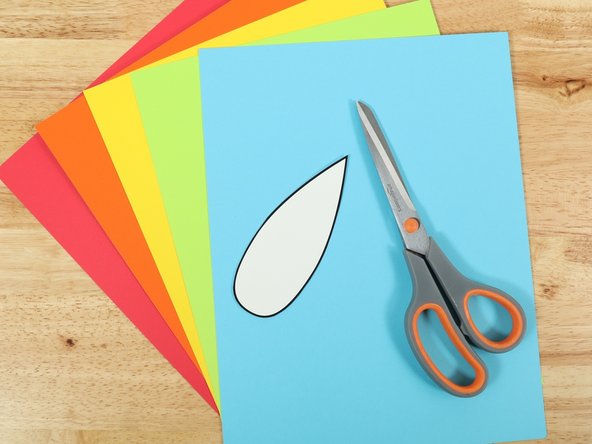 Using your feather template, trace and cut out the amount of feathers you want for your turkey.