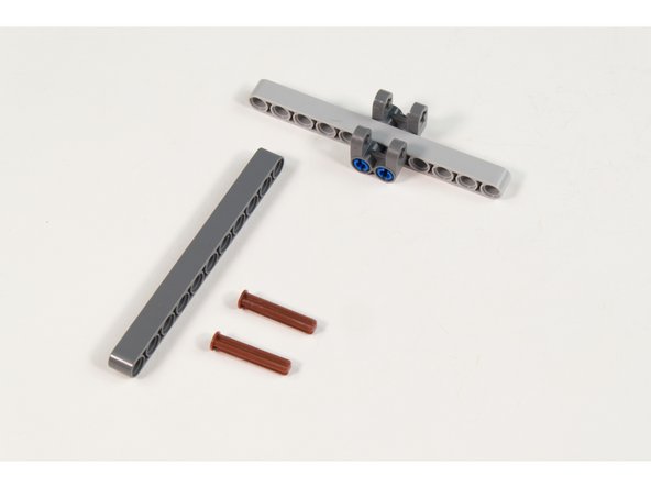 Two axles will be used to hold the beams together.