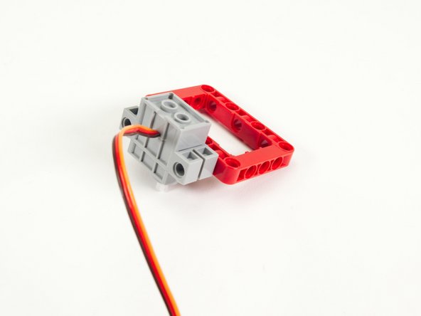 Note that the servo wire should face forward, opposite the frame.