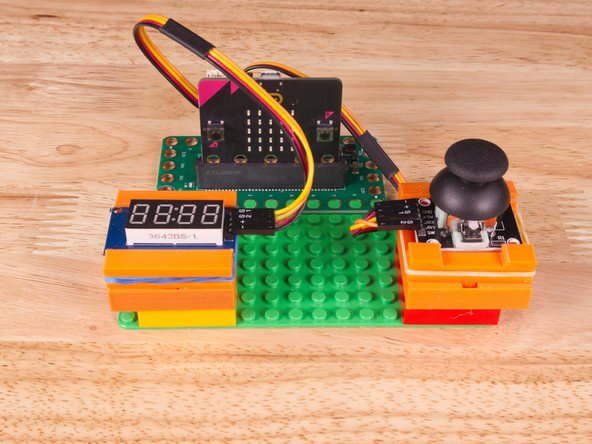 Alternately you can try to use some LEGO bricks and some rubber bands/tape to hold the sensors in place.