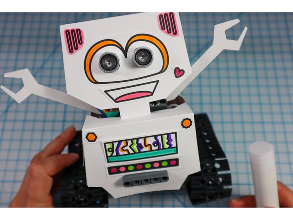 Color in the robot embellishments and glue them to the bot. What type of personality will your bot have?