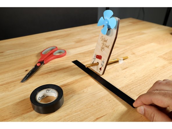 Put the Wind Wand in position and tape the pencil to the table behind it so that the wand doesn't move when tested.