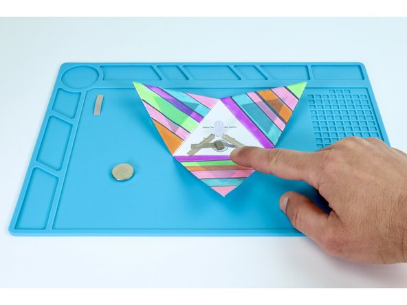 Place that tape loop atop the battery end of the tape path pictured in photo 3.