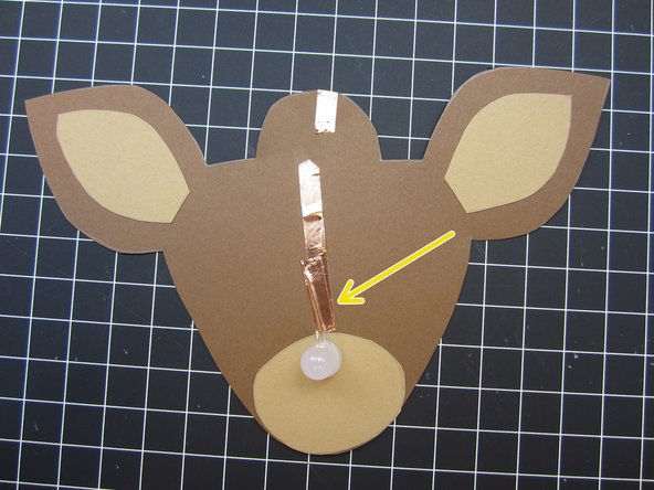 Use a small piece of Conductive Tape to tape down each of the legs.