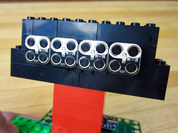Stick on the LEDs and Robotics Board.