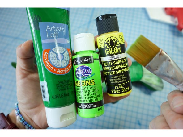 Paint the fish with acrylic paint. I found that using neon green paint looked great to make it really pop!