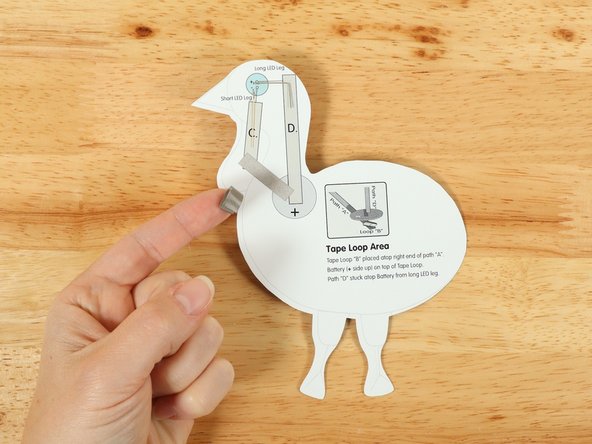 Make a loop of tape (sticky side out) using a short piece of Maker Tape, and stick it atop the end of Path A.