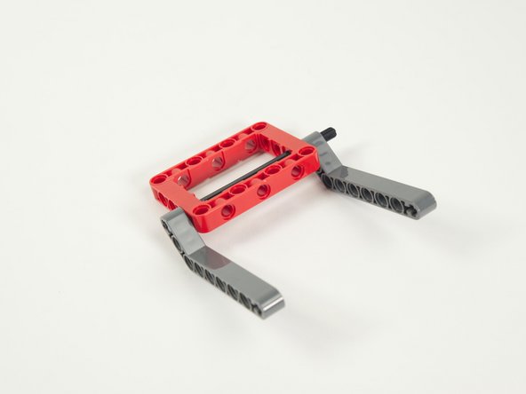 Note that the axle should stick out from the second beam, as this is where we'll add the large gear in Step 9.