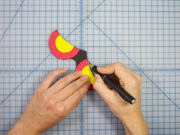 Trim away any excess foam visible around the edges by holding your cutter at an angle.