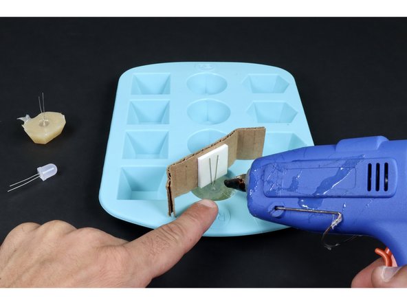 Attach a new LED to the cardboard/tape and make/remove a second jewel using the same process that you did for the first one.