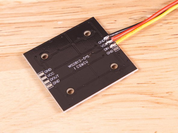 To begin we're going to connect three wires to the LED Matrix. We need three wires cut about 50mm long, with the insulation stripped off the ends. There should be about 3mm of exposed wire.