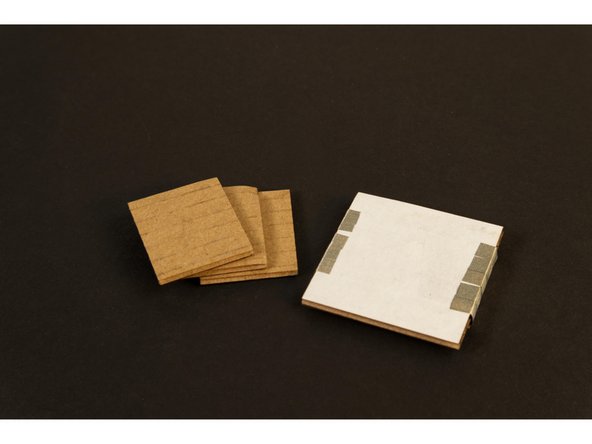 Attach Pieces 8, 9, and 10 to Piece 6 by gluing and stacking them. Make sure the pieces are all centered.