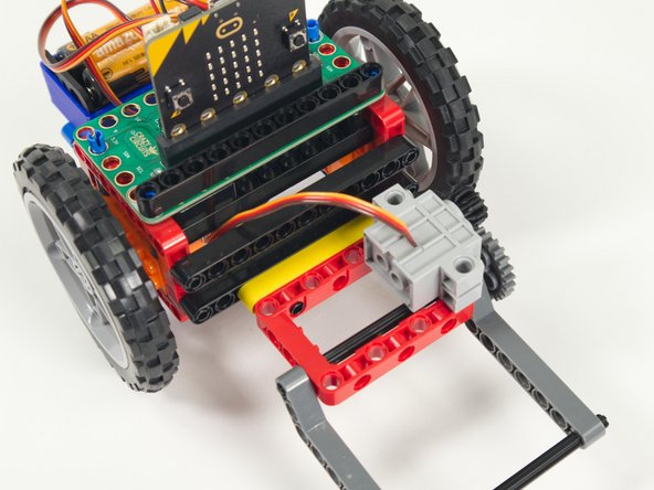 Center it and push it in so the pins lock it in place.