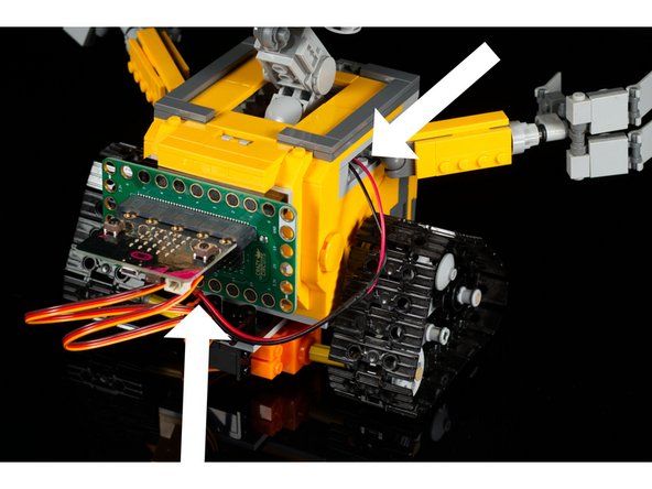 We were able to thread the battery pack wires through one of the gaps in WALL-E so we could run the connector to the Bit Board.