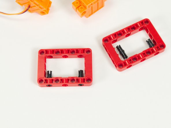 Each assembly will need one servo, one frame, and two black pins.