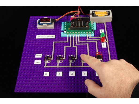 Once you've got the code loaded on the micro:bit you can test it out.
