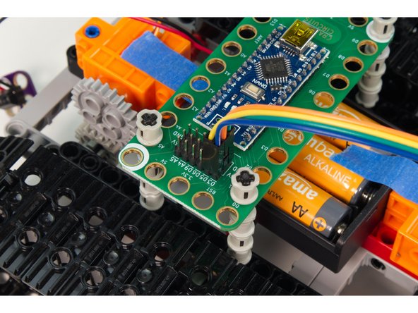 For the sensor you'll need to connect the echo pin to Pin 3 on the Robotics board, then connect the trigger pin to Pin 5, then VCC to 5V and Gnd to GND. This will power the sensor and allow it to talk to the Robotics Board.