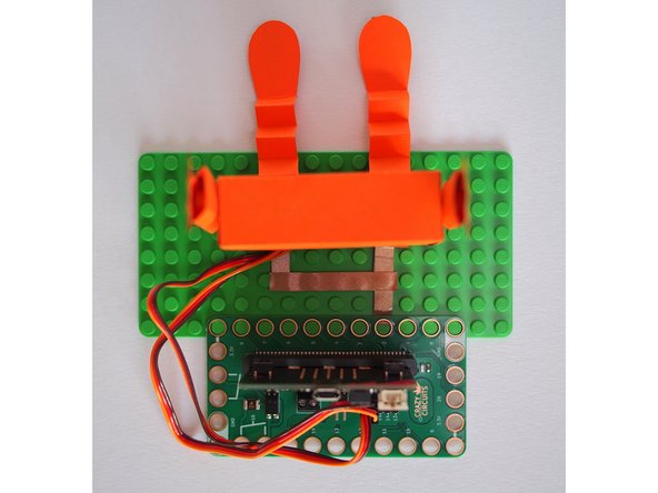 Place the Bit Board back on the LEGO plate and make sure that the Maker Tape is contacting Pin 2.