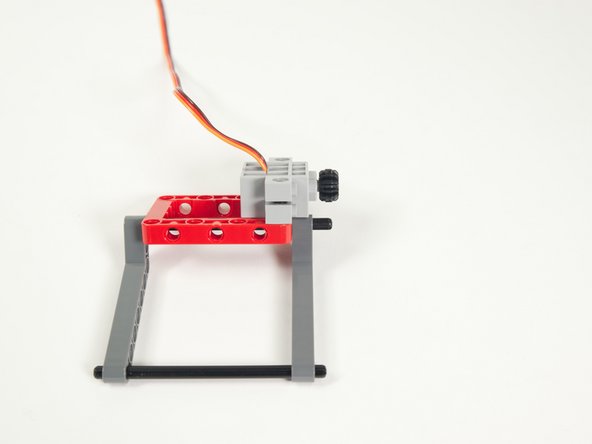 Make sure to press the gear all the way onto the shaft. This ensures it lines up with the other gear we'll add next.