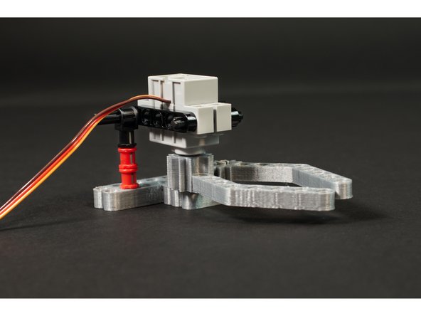 The one tricky part is that you'll need to line up the plus shaft of the servo to the plus hole on the finger. This shouldn't be too difficult, as you can rotate the finger to line things up.