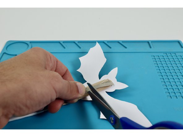 Measure and cut three pieces of Maker Tape that are approximately the same length as the Short LED Legs.