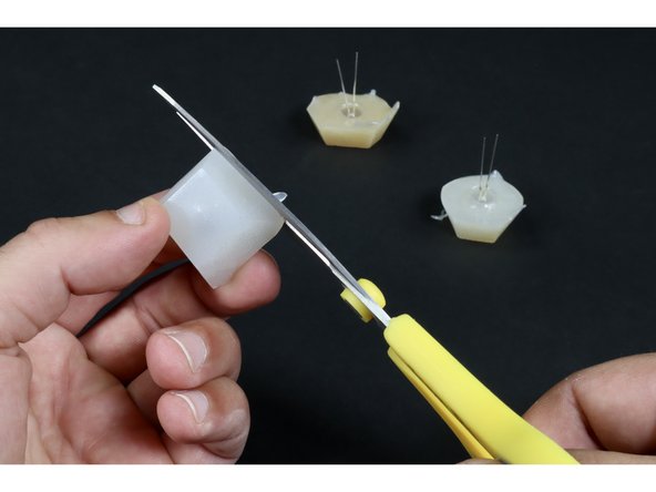 Use a scissors to remove any weird excess making the jewel edges nice straight and enabling the jewels to lay flat!