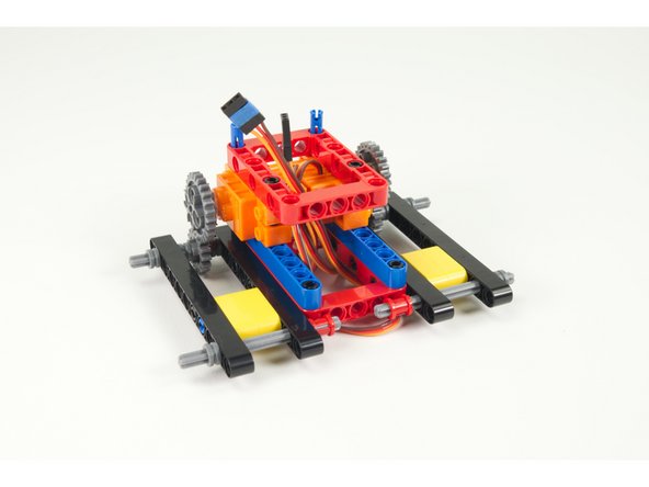 We added a piece of blue tape to the left servo connector. This is to help us identify which servo plugs into which pins later on.