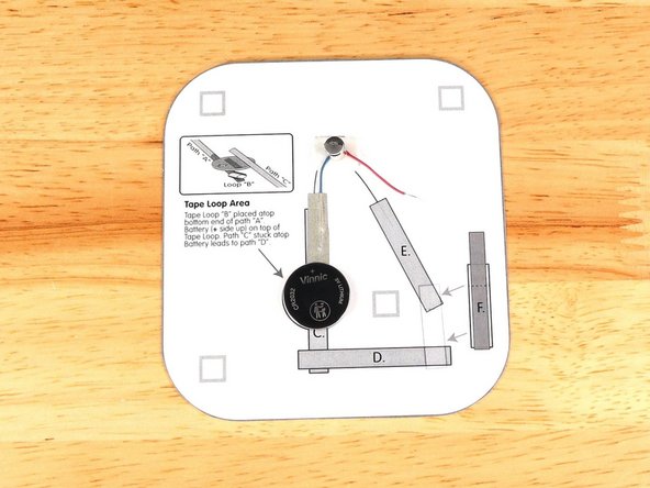 Make sure the Positive side of the Battery is facing upwards, with the Negative side stuck down to the tape.