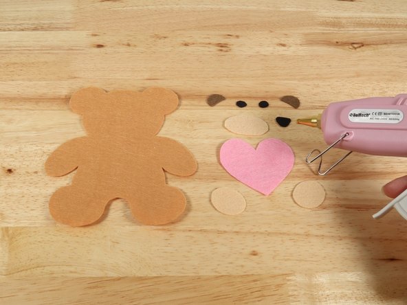 Use glue to assemble the Teddy Bear as pictured.
