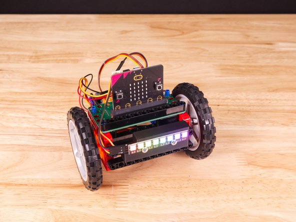 With pin holes on the bottom and back of the Rover NeoPixel Beam Holder there are multiple mounting options.