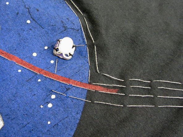 It doesn't matter HOW you get to the Positive side of each LED, as long as you don't cross any &quot;wires&quot;.  AKA The Conductive Thread.