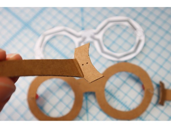 Fold the temples along the line.