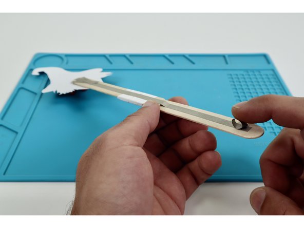 Stick that tape loop in place atop the far end of the long path from the previous step as shown.