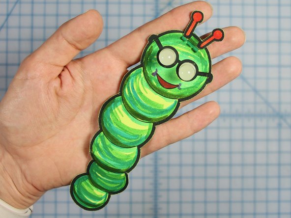 Glue your antenna in place on top of the binder clip.