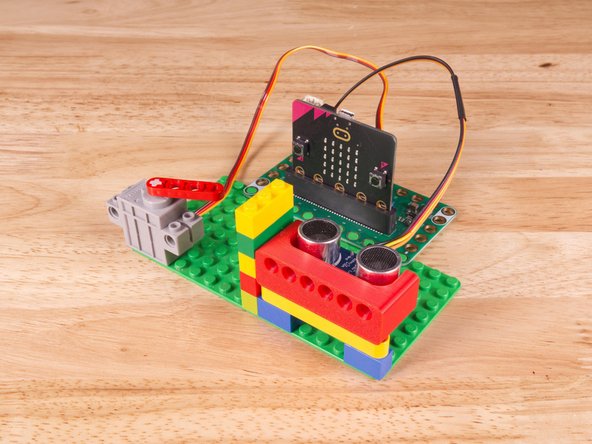 Then the Brown Wire should be closest to the micro:bit (in the - row) and the Red Wire will be in the middle (the +5v row).