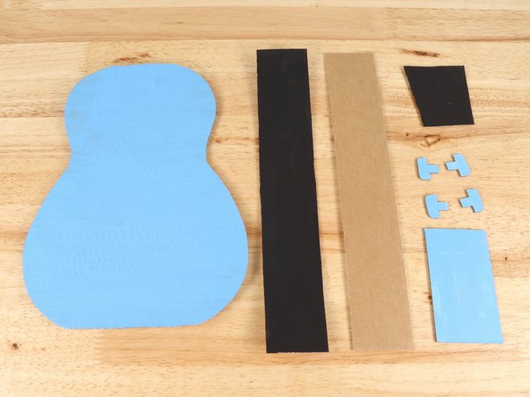 Paint or decorate the parts of the guitar. You can use acrylic paint, markers, or even stickers!