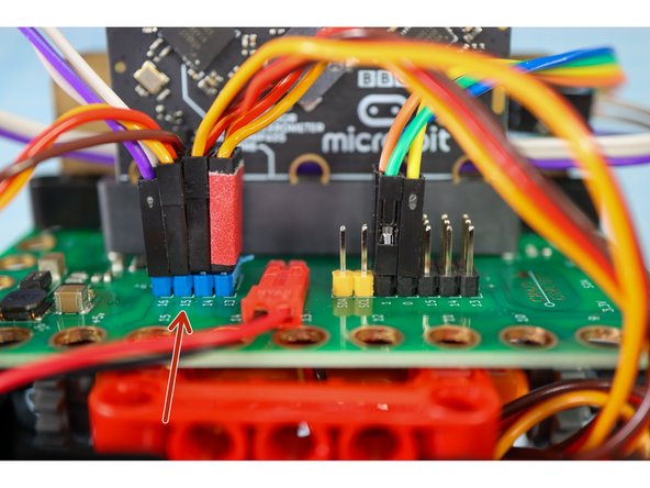 Connect the motor wires to Pin 15 as shown.