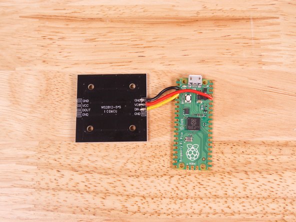 The red wire goes to the 3V3 pin.