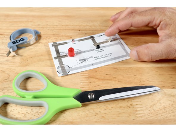 Measure, cut, peel, and stick Maker Tape paths A-F where shown on the diagram. These Maker Tape paths are all placed on TOP of component legs. In this order, all components should now be lightly held in place.