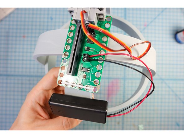 Secure the wires into the screw terminals with a small screwdriver.