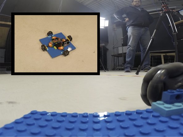 Adding a top plate might make it difficult to reach the battery pack, though you can easily remove the top plate to access it.