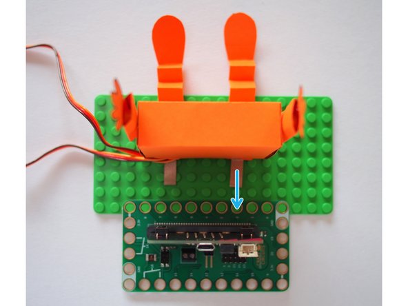 I suggest lining up one of the leg tabs with Pin 2 on the Bit Board to make it easier to connect.